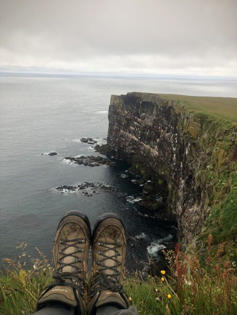 Hiking boots on edge of cliff