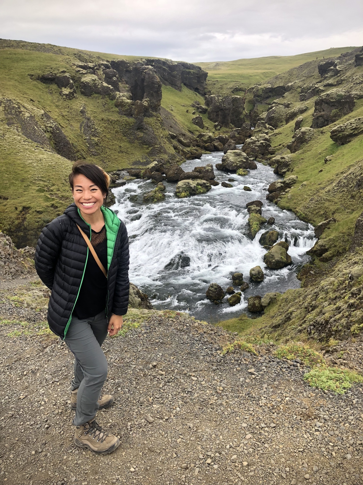 Posing by a large river in Iceland
